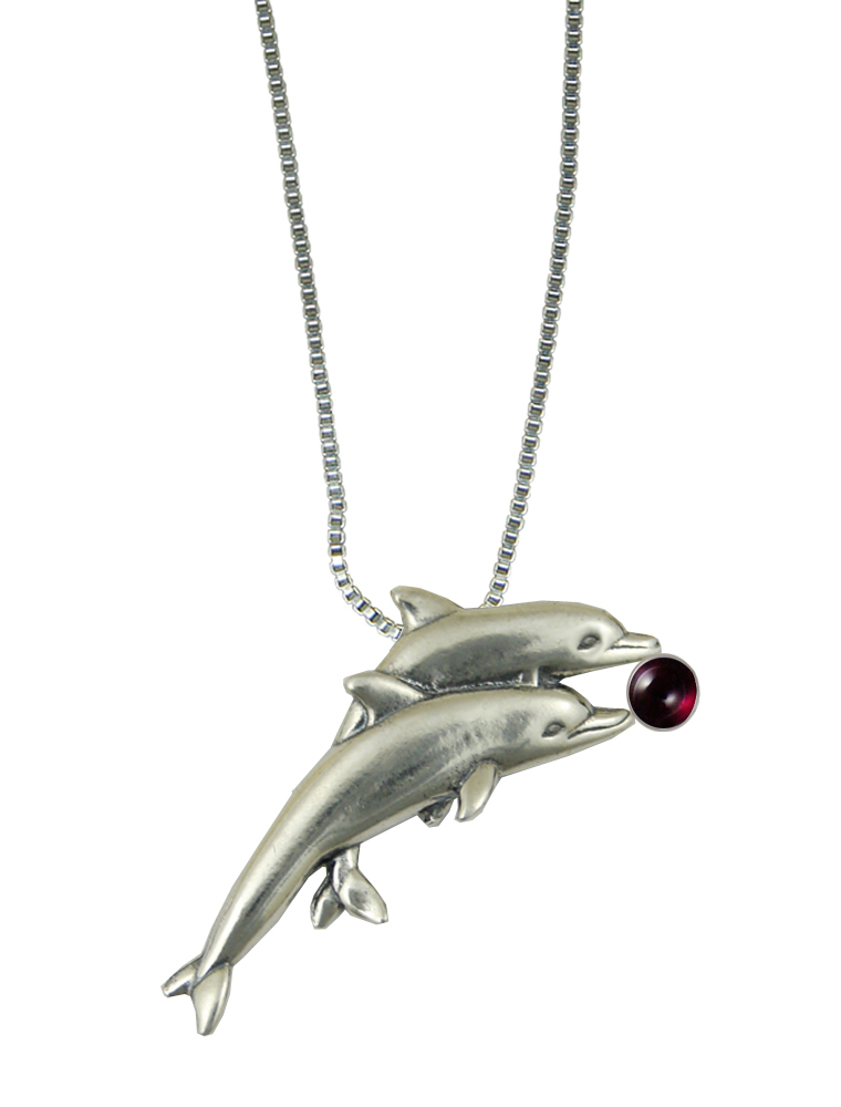 Sterling Silver Pair of Dolphins Pendant With Garnet
